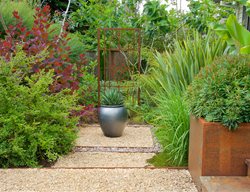Silver Ceramic Pot In Modern Garden
Garden Design
Calimesa, CA