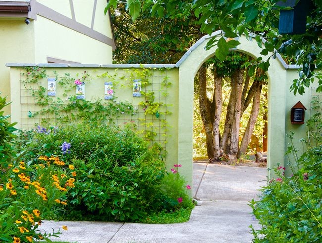 Walled garden with arched entrance